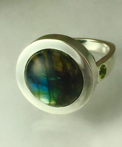 Heavy bezel sterling silver and round labradorite ring